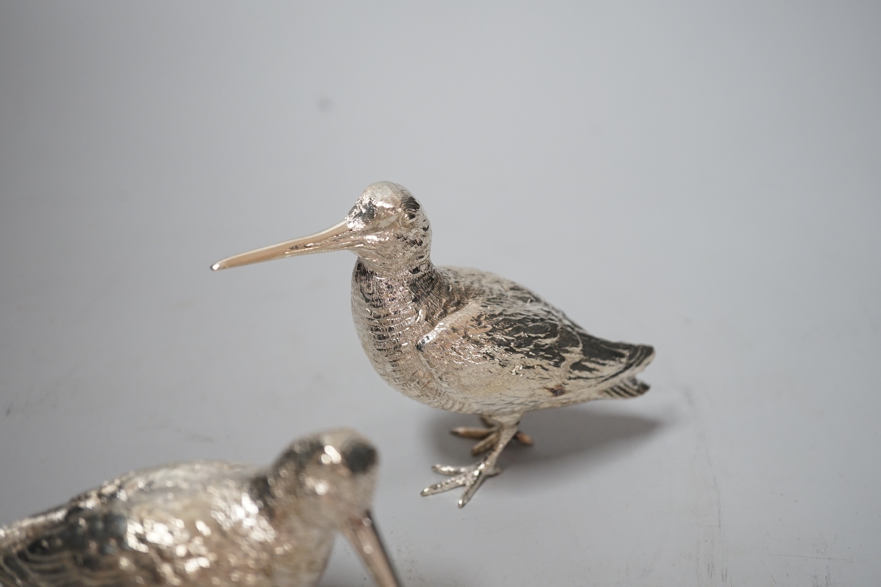 A pair of Elizabeth II silver model free-standing woodcocks, BSE Products, London, 2017, tallest 75mm, 10.5oz.